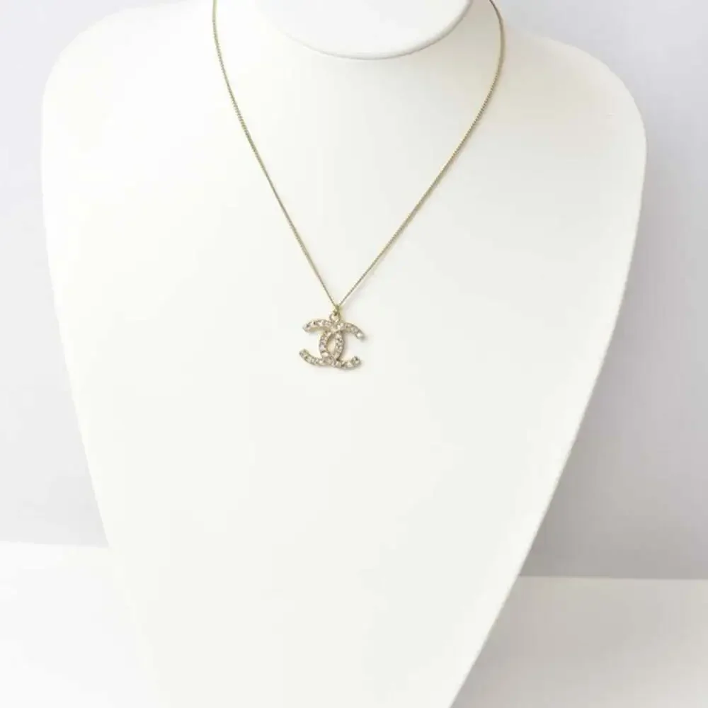CHANEL Gold Logo Necklace